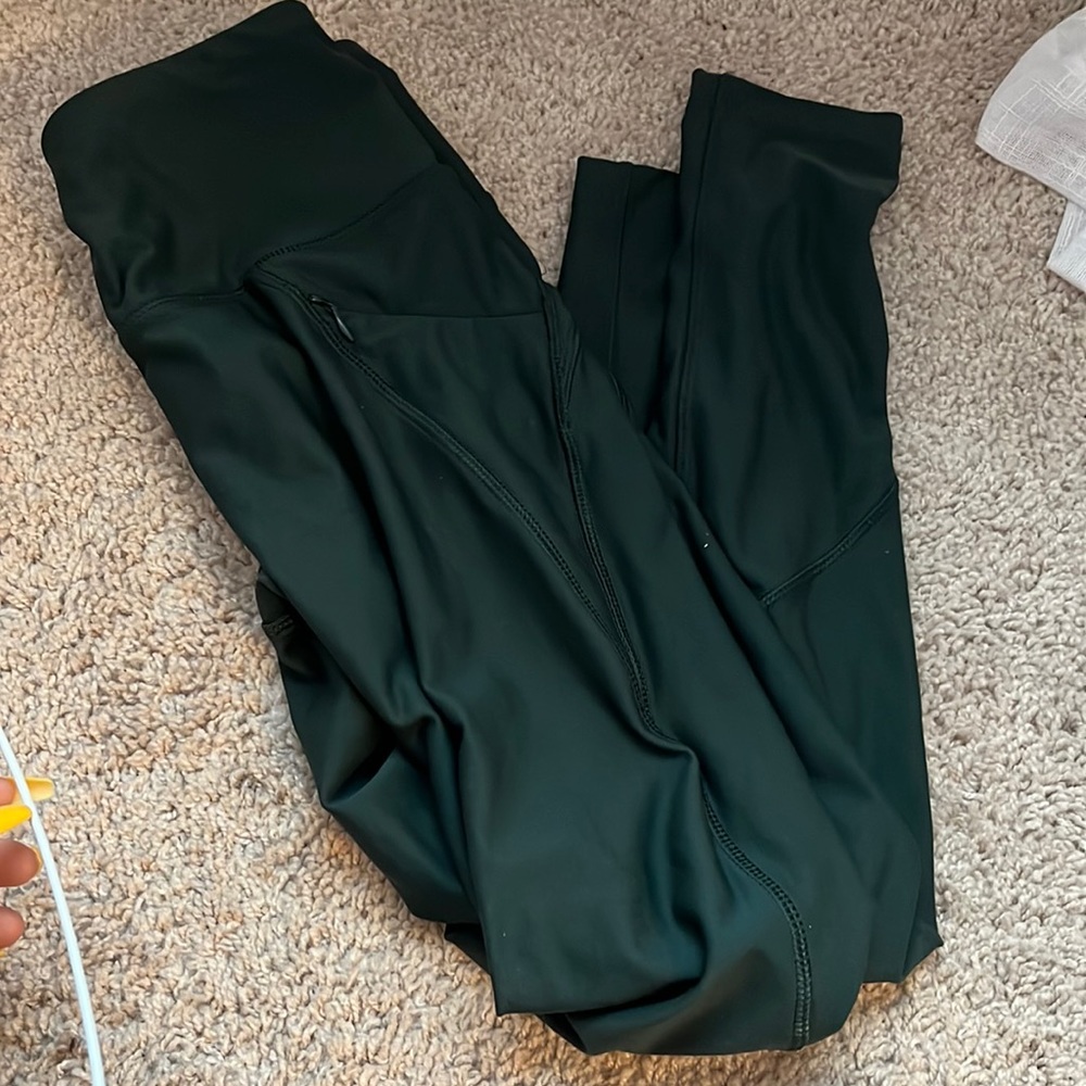 Green leggings with zipper